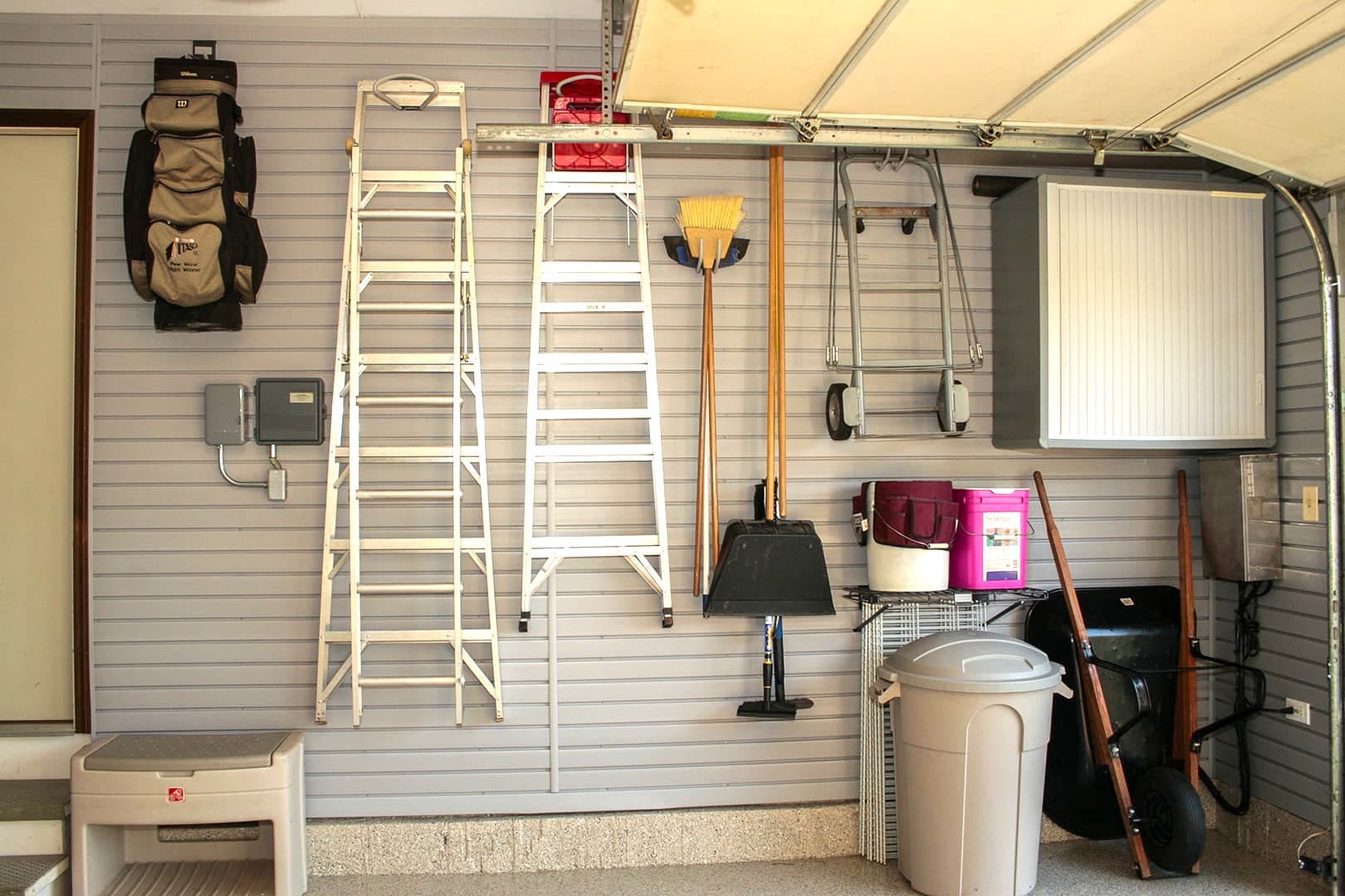 Slatwall systems helps keep ladders and other equipment out of the way.