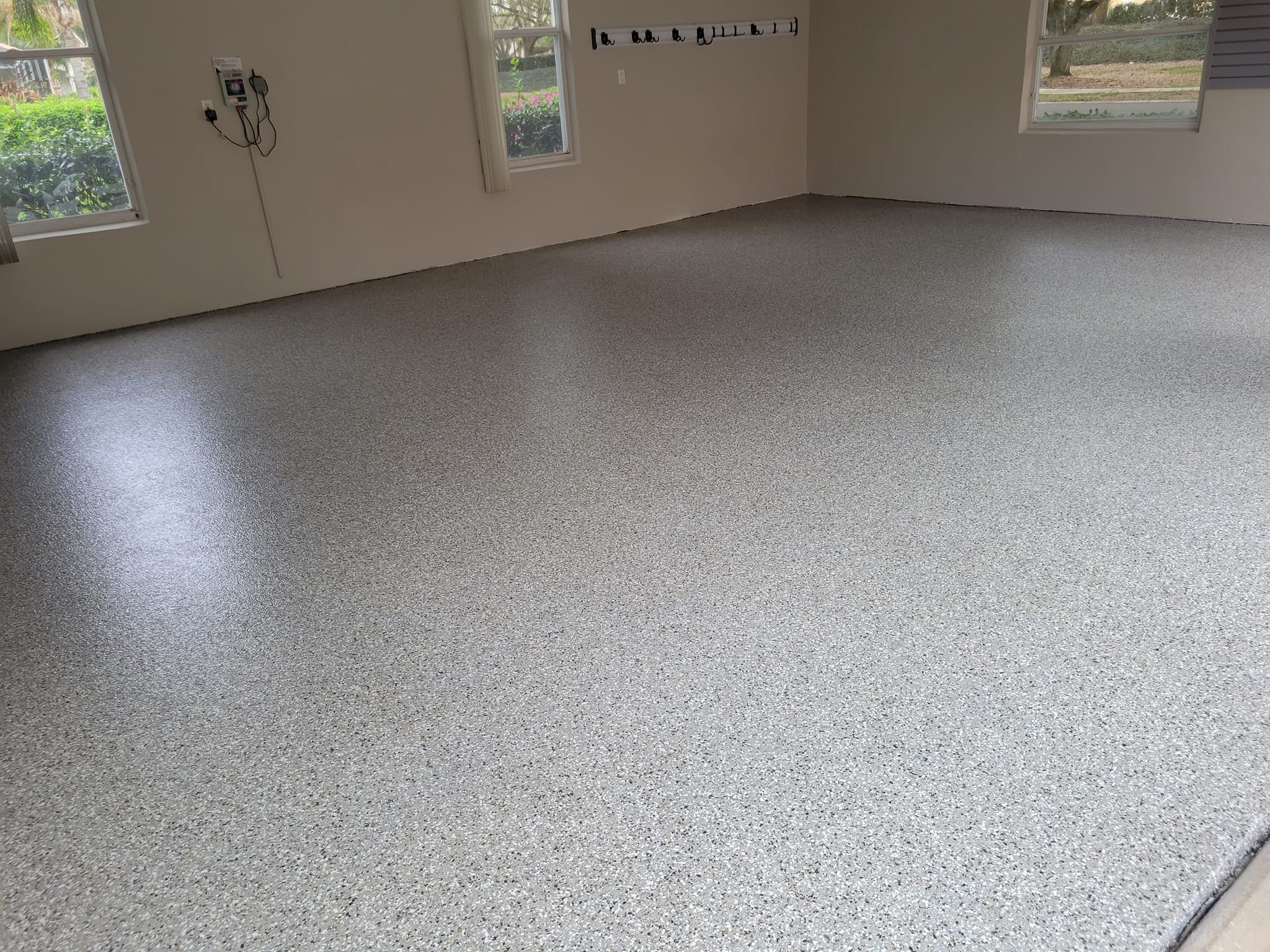 Why Your Garage Needs Polyaspartic Flooring - The Smarter Garage